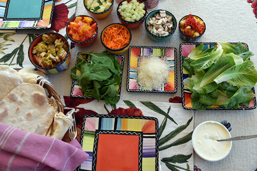 soaked pita veggie wraps ingredients arrange on table