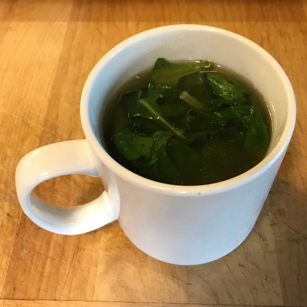 Bone Broth Over Spring Greens - Sustainable Yum
